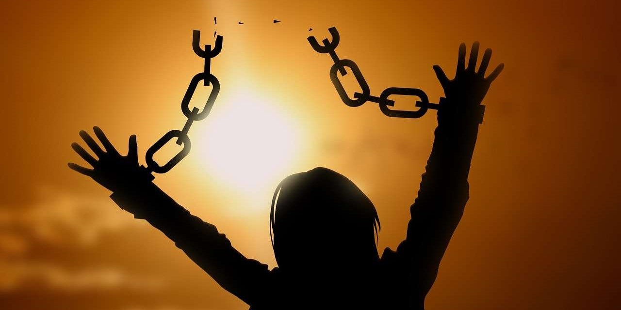 Delivered person breaking chains